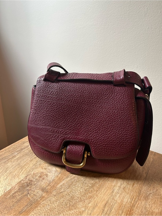 J. Crew Handbags - J Crew Pebbled Leather cross body Saddle Bag in Burgundy